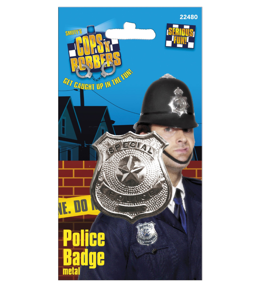 Kovový policejní odznak